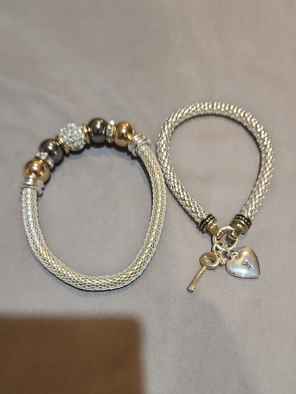 Nine West Two-Tone Silver and Gold Mesh Charm Bracelets with Heart & Key